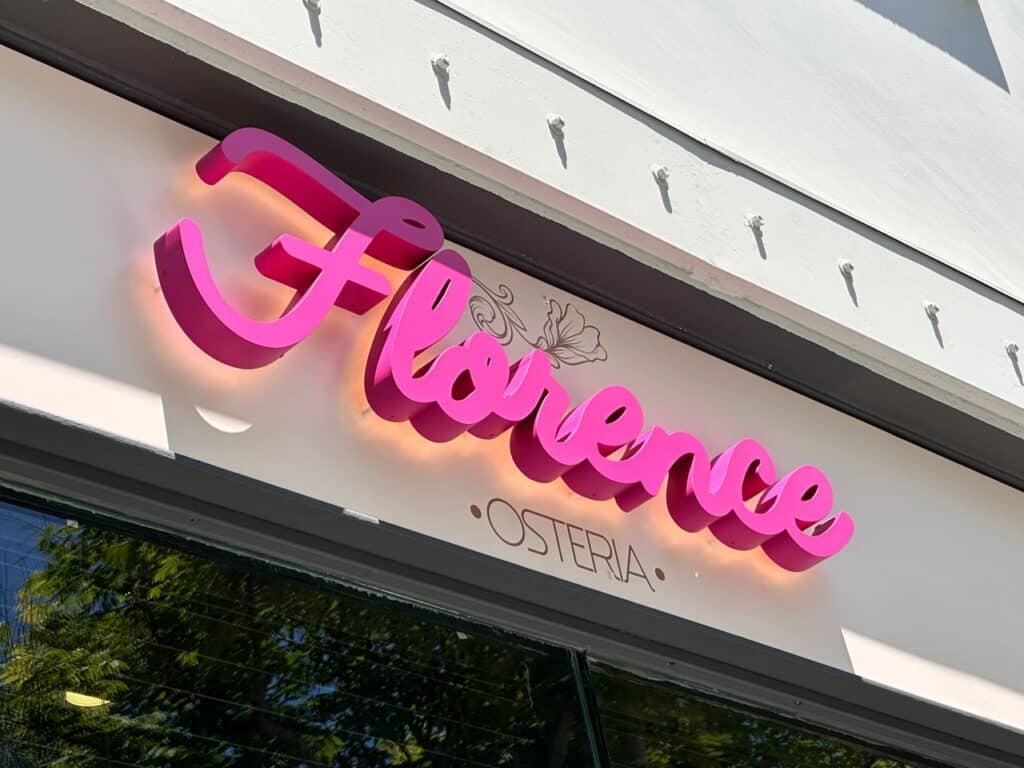 restaurant storefront signage with pink channel letters Florence Osteria Santa Monica, CA