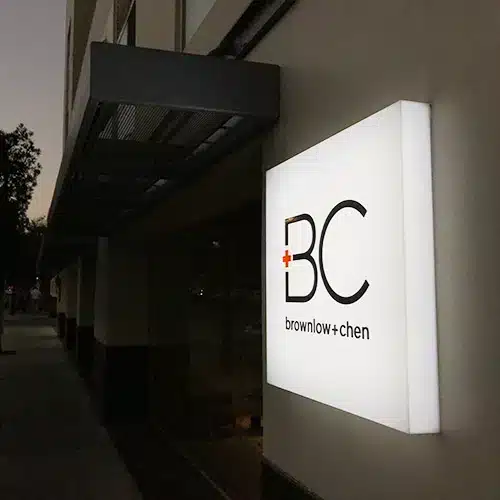 LED blade sign on Magnolia Park storefront in Burbank, CA installed by Los Angeles Sign Company.