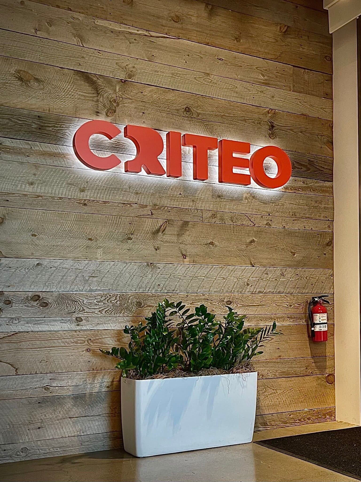 Interior Signs in Los Angeles, CA (v2 design) 4 Backlit dimensional logo letters on a wood accent wall in Downtown Los Angeles
