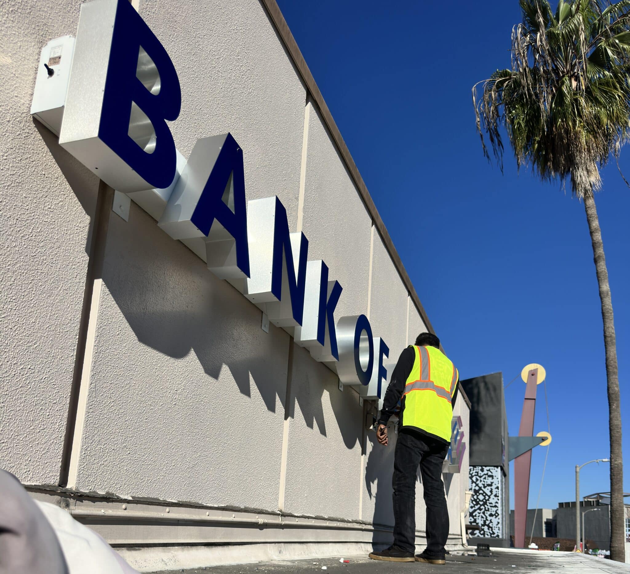 Guess flagship retail halo-lit illuminated reception sign installation