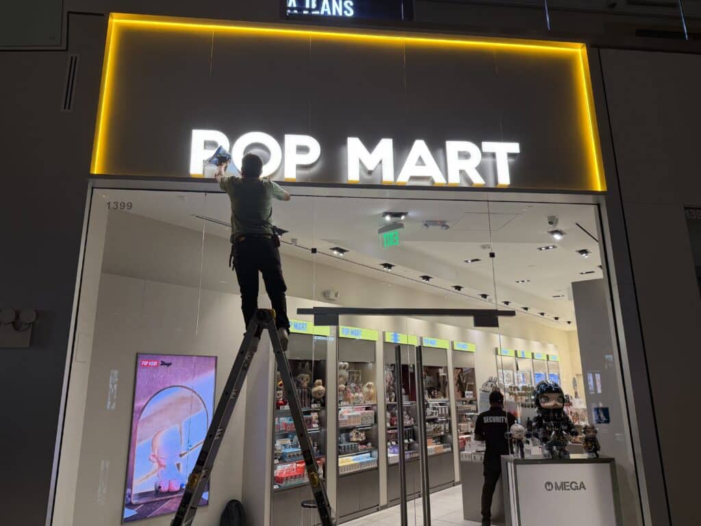 pop Mart sign install