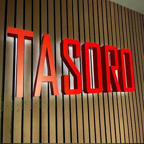 Business Sign Light Repair in Los Angeles, CA 4 Red halo-lit dimensional LED letters on a wood wall